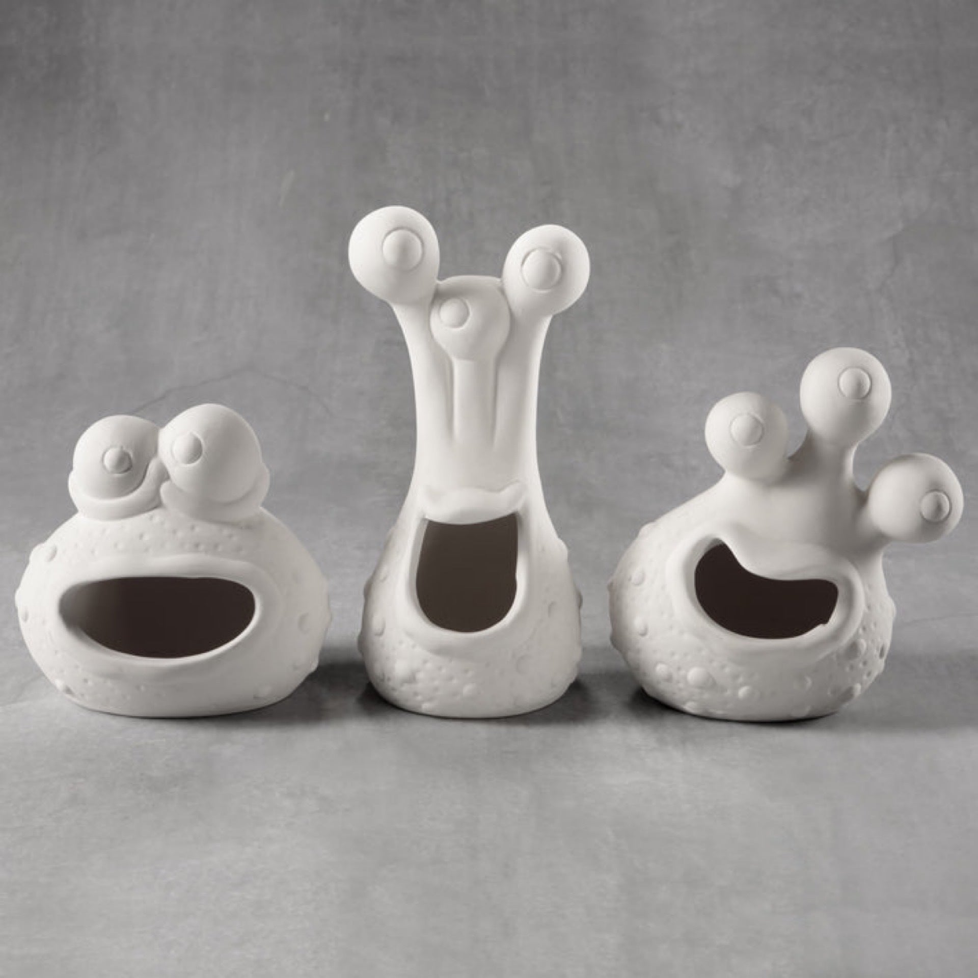 Assorted Monster Heads Pottery Haven